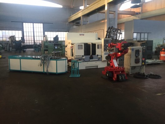 Isola tornitura OKUMA HOWA + robot COMAU usata