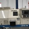 Tornio cnc OKUMA LB15II W contromandrino con caricatore di barre LNS usato