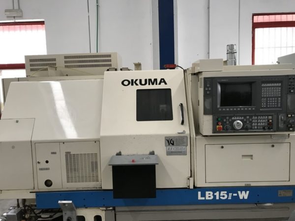 Tornio cnc OKUMA LB15II W contromandrino con caricatore di barre LNS usato