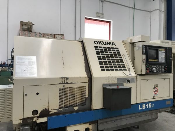 Tornio cnc OKUMA LB15II con spingibarra LNS usato